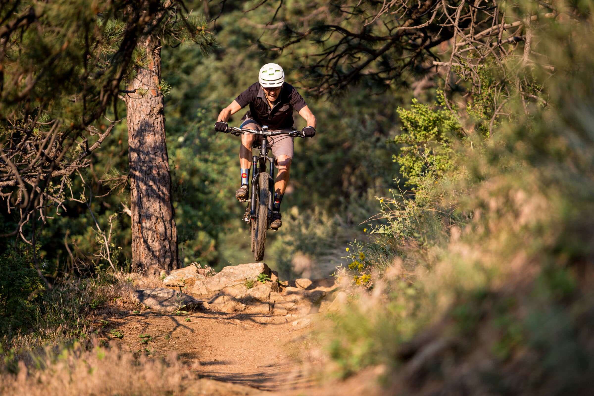 demo mountain bike out for a ride in denver area