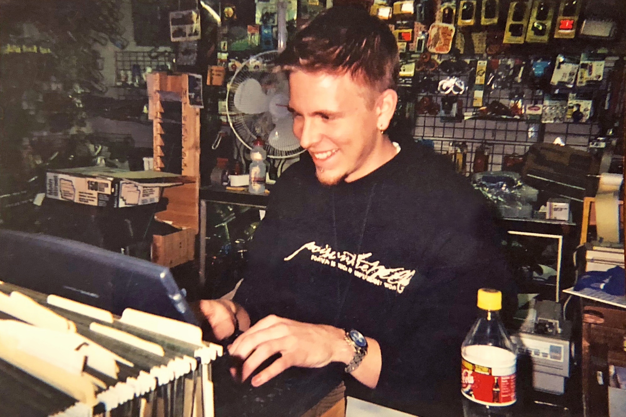 man working at full service bike shop