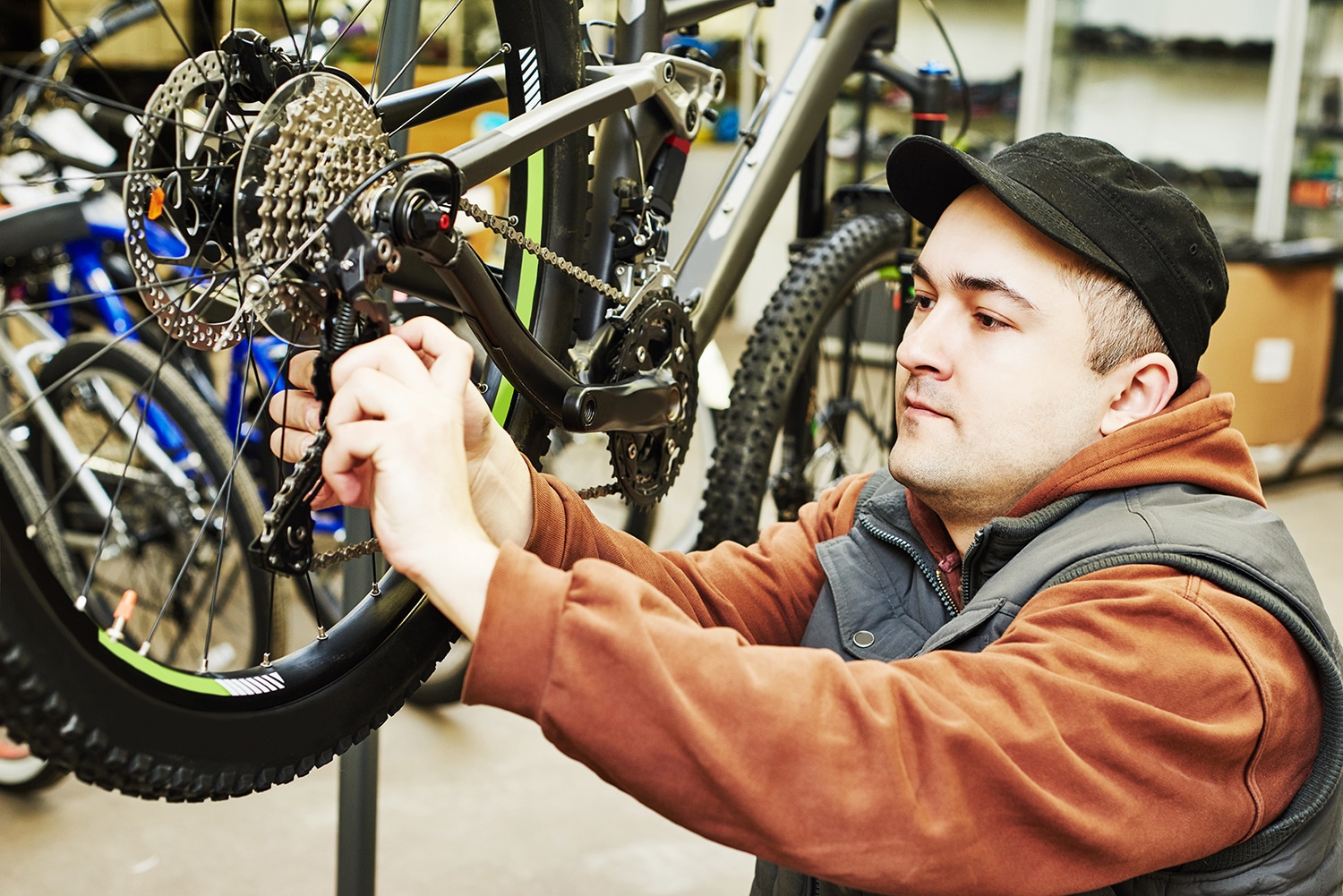 Mechanic performing service on mountain bike