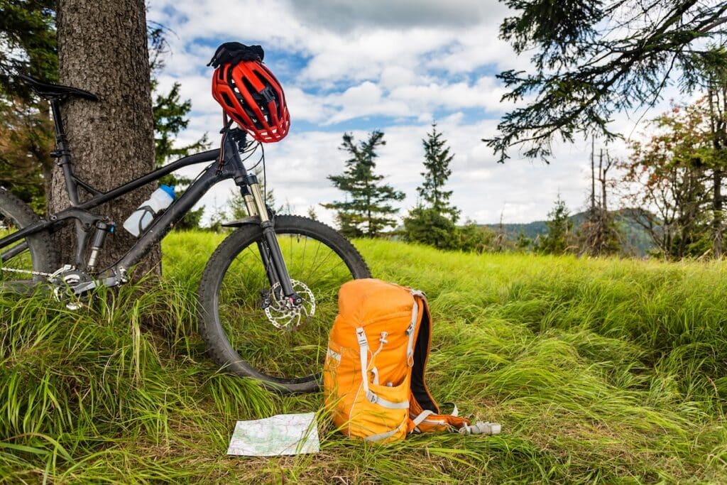 mountain biking gear on a wilderness trail