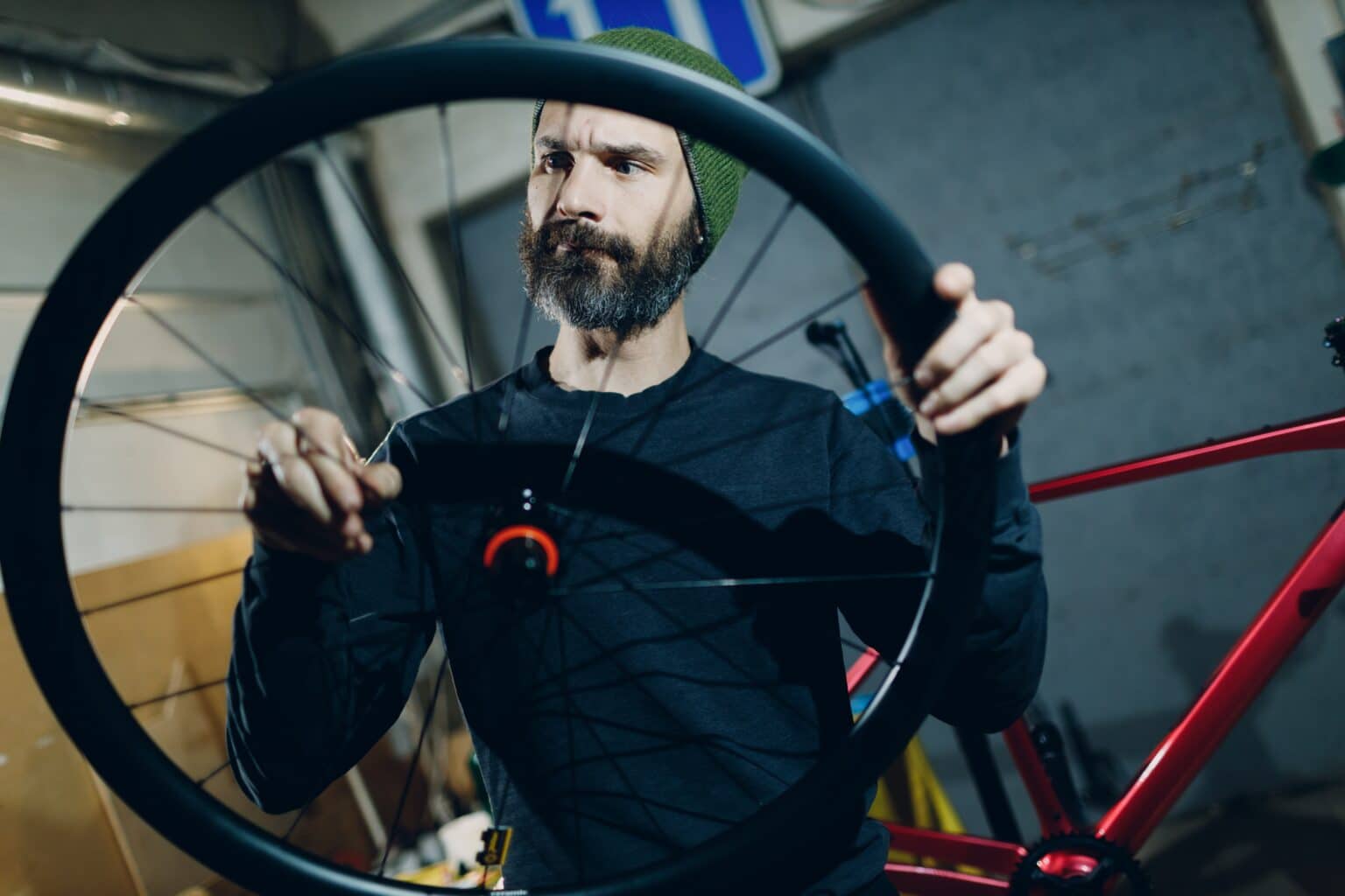 mechanic performing mountain bike wheel upgrade